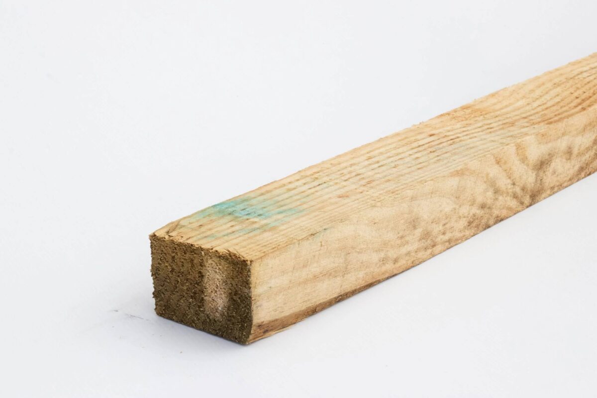 Treated timber rail for temporary hoarding
