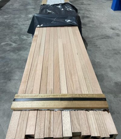 Timber batten used as a vertical hoarding infill strip
