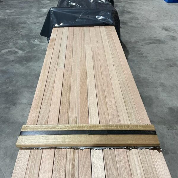 Timber batten used as a vertical hoarding infill strip