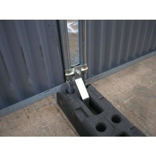 Anti-lift bracket securing a temporary fence panel to its base
