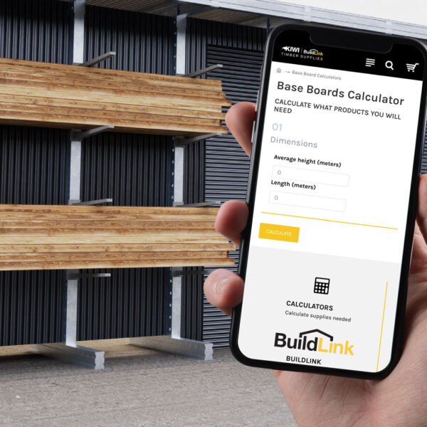 Timber estimating calculator shown on a phone beside stored construction timber