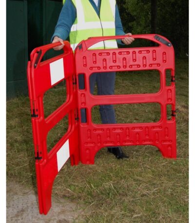 Portable folding red construction safety barrier with reflective strips