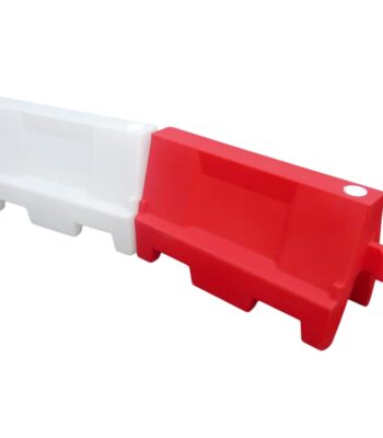 Interlocking red and white 1.5 metre water-filled traffic barrier